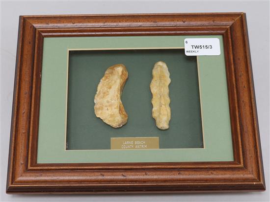 A collection of framed Neolithic and other tools and flint arrow heads,